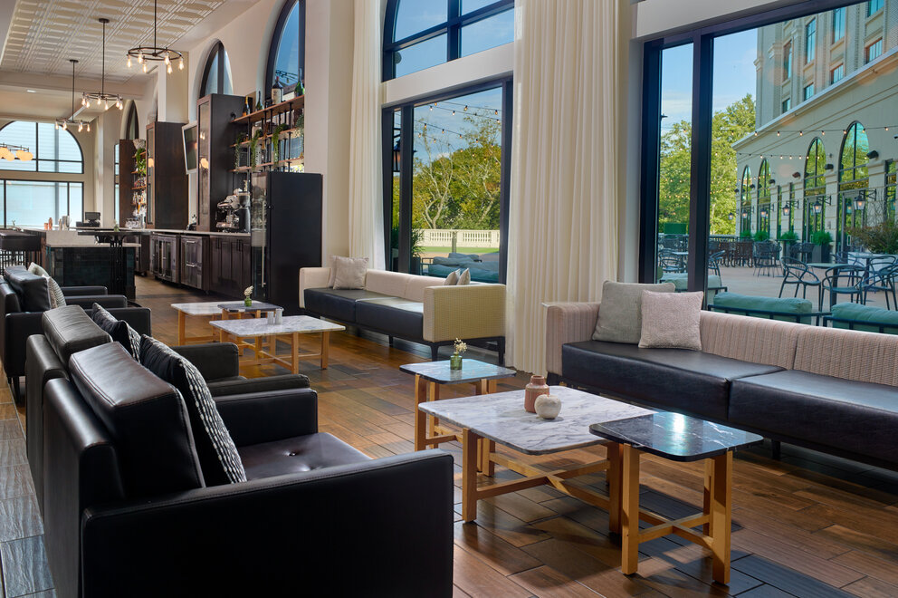 a room with couches and tables